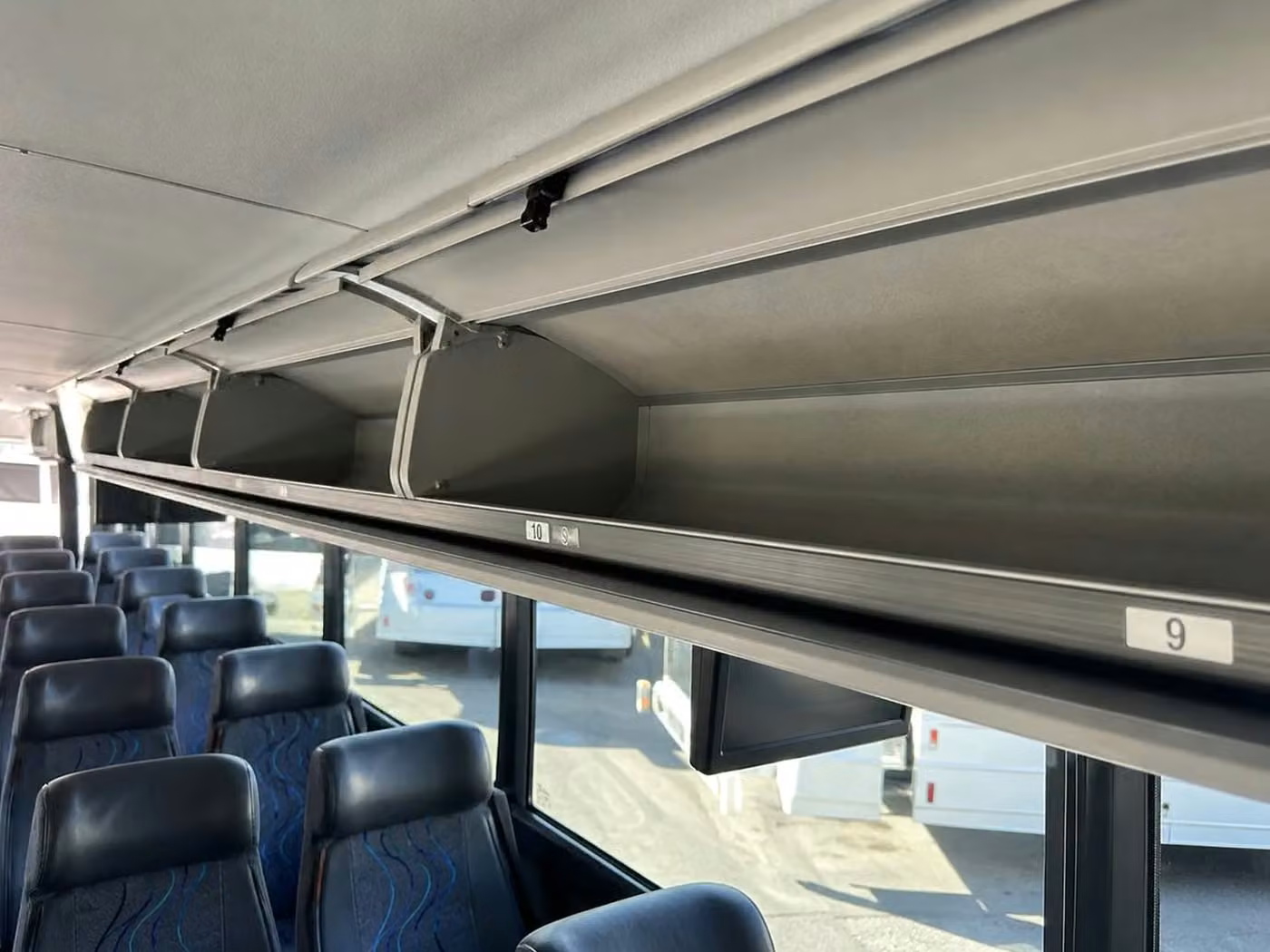 ames 18 passenger minibus overhead storage