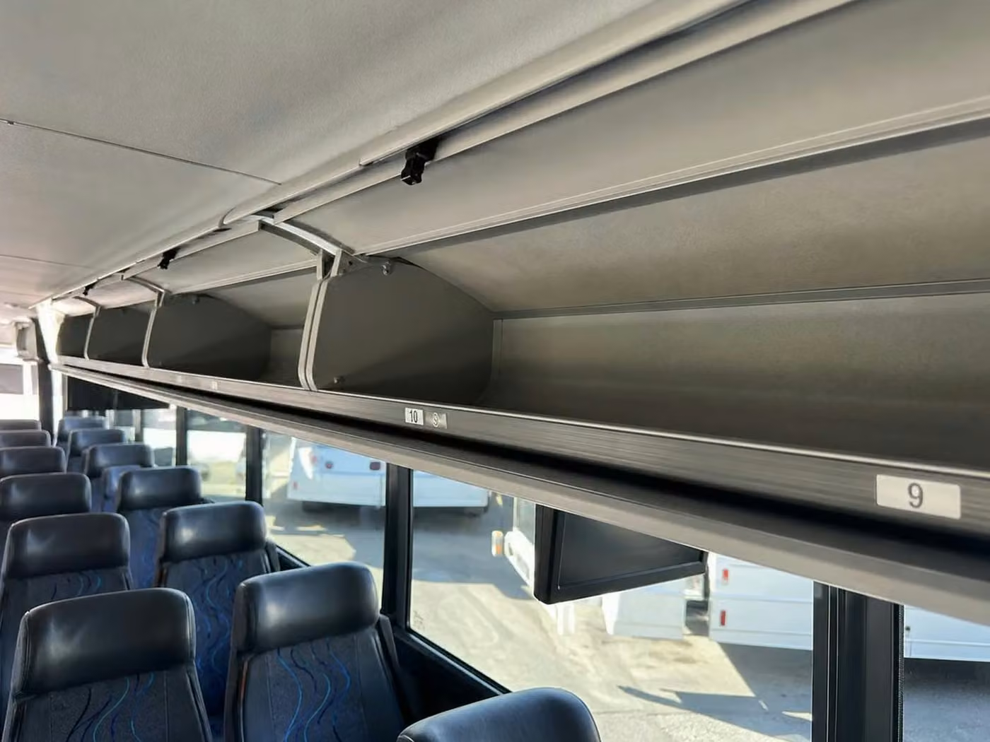 ames 28 passenger minibus overhead storage