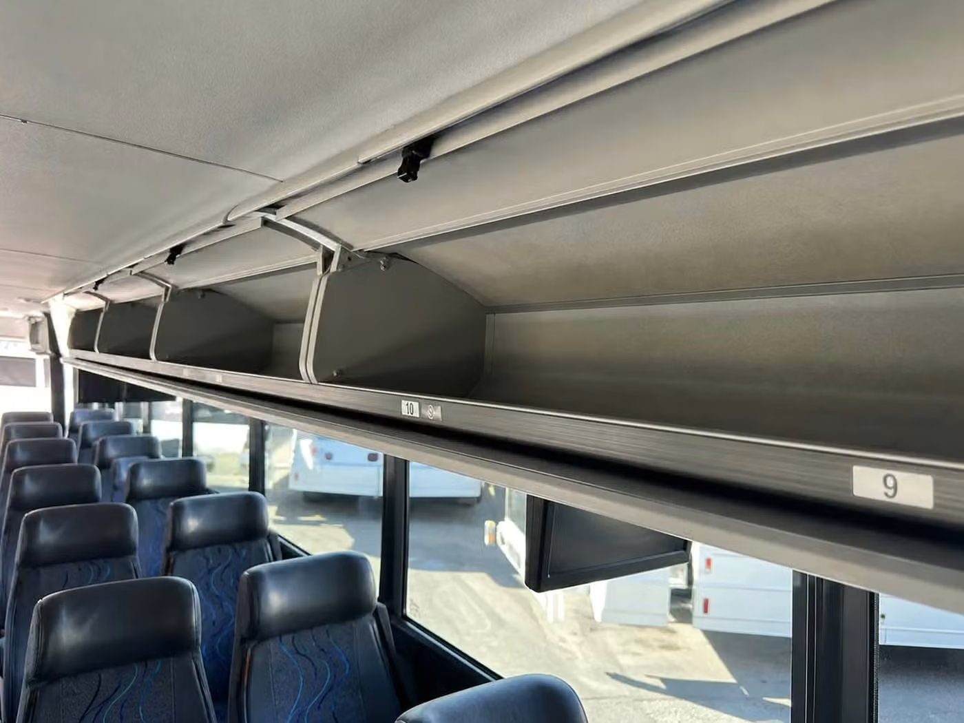 ames 35 passenger minibus overhead storage