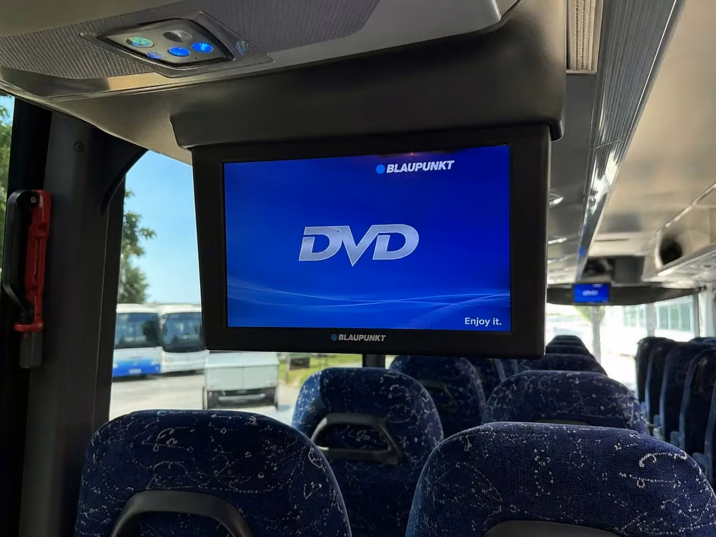 ames 56 passenger charter bus tvs